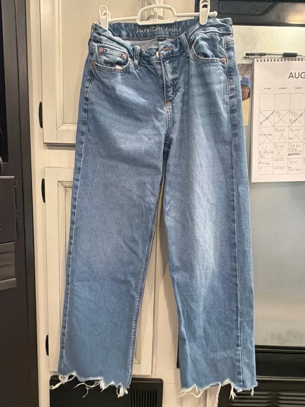 American Eagle Outfitters Light Blue Wide-Leg Jeans with Frayed Hem